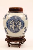 A CHINESE BLUE AND WHITE ‘BOYS’ JAR. Qing Dynasty, Kangxi era. Decorated with quatrefoil panels