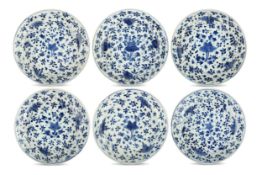 A SET OF SIX CHINESE BLUE AND WHITE DISHES. Qing Dynasty, Kangxi period. Each freely painted with
