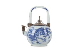A CHINESE BLUE AND WHITE 'DRAGON' TEAPOT AND COVER. Qing Dynasty, 18th Century. The ovoid body