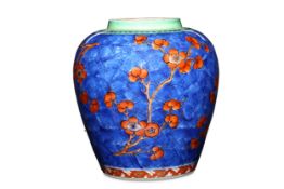 A CHINESE CLOBBERED BLUE AND WHITE 'PRUNUS' JAR. Qing Dynasty, Kangxi period. The ovoid, slightly