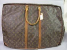 Louis Vuitton holdall with leather handles (at fault)