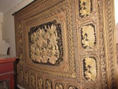 Large Indian gold thread work wall panel having central panel decorated in high relief with