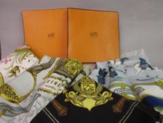 Two ladies Hermes silk head scarves with original boxes and two other ladies Hermes silk head