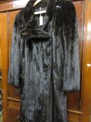 Ladies dark mink fur coat, labelled M.B. Turkis