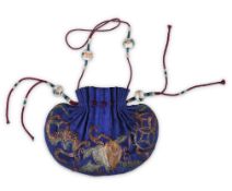 A CHINESE EMBROIDERED SILK SNUFF BOTTLE POUCH.  Late Qing Dynasty. One side in vivid blue, the other